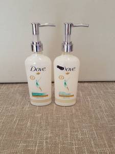 lot 4219 image: Dove Shampoo and Conditioner Pump Bottles 250ml Set of 2