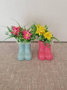 lot 4259 image: Decorative Boot-Shaped Flower Vases Pair Light Blue Pink