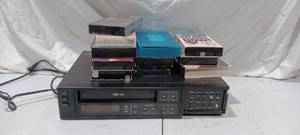 lot 36008 image: Zenith Video Recorder VHS Tape Player & Misc VHS Tapes.