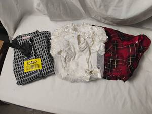 lot 35682 image: CHILDRENS black and white coat size 24m, white dress size 3T, and red plaid dress size 12-18m
