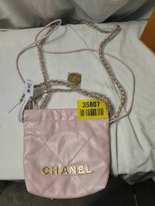 lot 35807 image: LvL 5 Replica Pink Chanel Cross Body Bag.