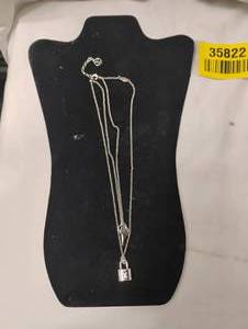 lot 35822 image: LvL 5 Replica - Silver Louis Vuitton Necklace.