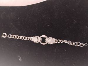 lot 35836 image: LvL 5 Replica - Iced - Out Panther Head Cuban Bracelet.