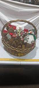 lot 35932 image: Christmas bundle of pinecones, 3 stuffed seasonal decorations, all gathered in a wicker basket