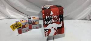 lot 35942 image: Christmas candy cane vase with table cloth and matching Christmas red bulbs