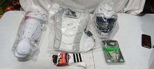 lot 35926 image: Set of sports safety gear, Sports socks, helmet, knee guards, chest guard, youth 6-8 guard