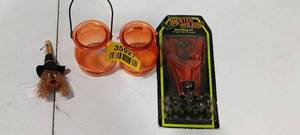 lot 35927 image: Halloween decor, two orange glass jars with handles, small witchs broom, haunted hallows decorating set