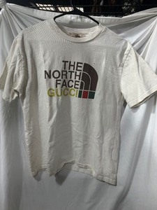 lot 35906 image: The North Face Gucci Shirt - Adult Small.