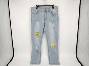 lot 605 image: Shein Light Wash Distressed Denim Jeans w Yellow Star Print Patches Size L