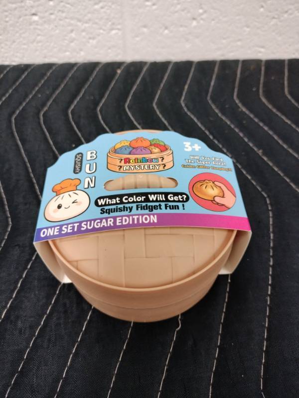 lot 50 image: Squishy Bun Rainbow Mystery Steamer Basket Fidget Toy Sugar Edition