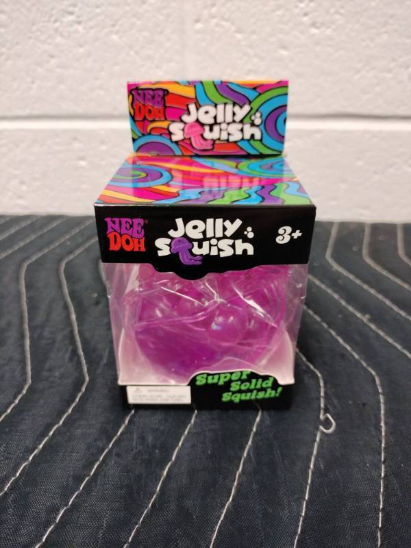 lot 81 image: Nee Doh Jelly Squish Squeezy Stretchy Jellyfish Toy, Purple, Ages 3