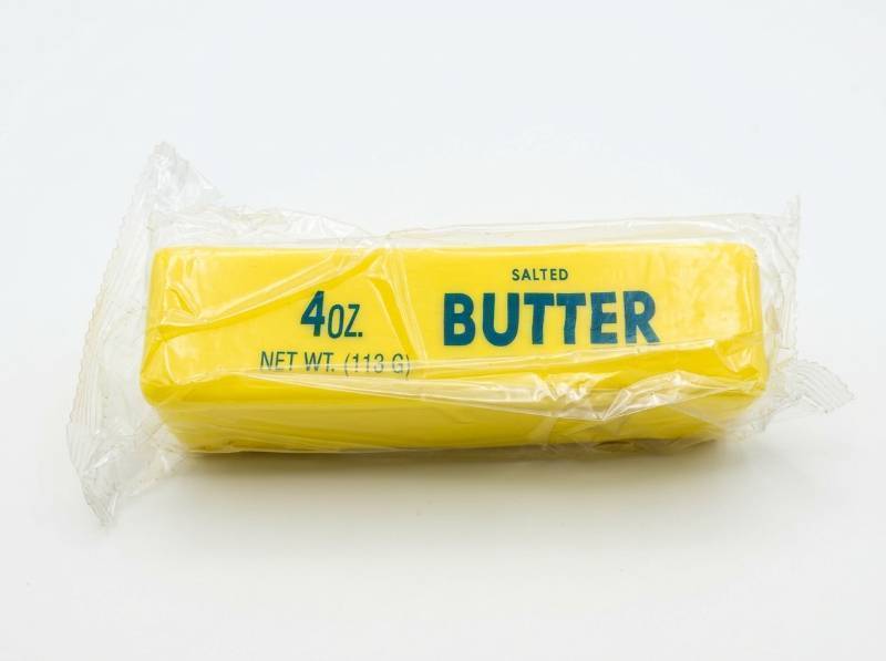 lot 88 image: Butter Squishy Toy Stick Replica 4oz Salted Butter Design
