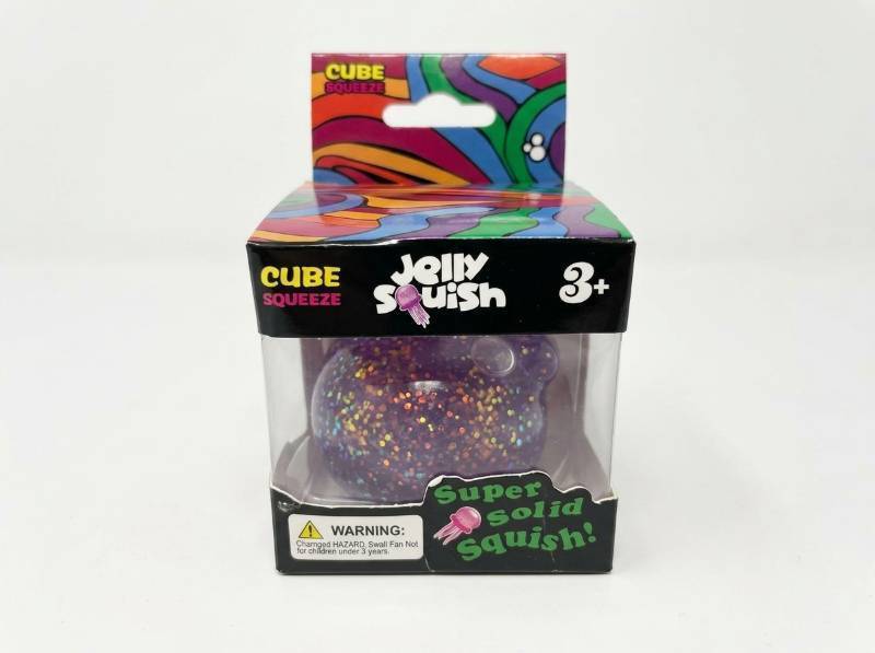 lot 92 image: Cube Squeeze Jelly Squish Purple Glitter Jellyfish Squeeze Toy Ages 3