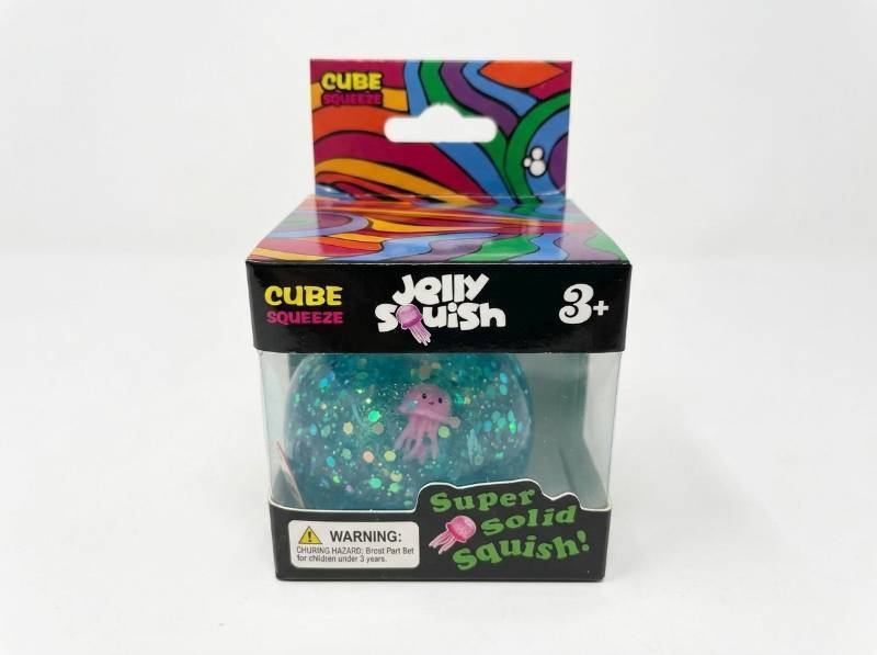 lot 95 image: Cube Squeeze Jelly Squish Blue Glitter Jellyfish Squeeze Toy Ages 3