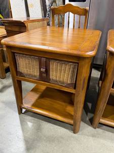 lot 103 image: Wood end table with basket storage 25 x 23 x 27 in