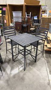 lot 204 image: Metal patio pub style table 36 x 27 x 27 in with 2 matching stools (seats have clips for cushions to tie onto allowing the cushions to easily be pulled up and put away from harsh weather