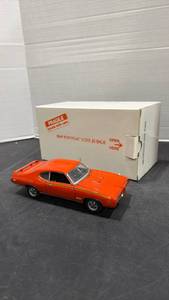lot 1012 image: 1969 Pontiac GTO Judge orange scale model car with box