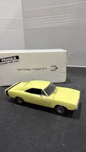 lot 1015 image: 1969 Dodge Charger RT yellow scale model car with box