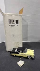 lot 1016 image: 1950 Chevrolet Bel Aire Hardtop yellow scale model car with box