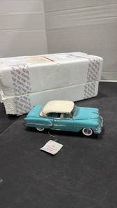 lot 1017 image: 1954 Chevrolet Bel Aire Hardtop blue scale model car with styrofoam box