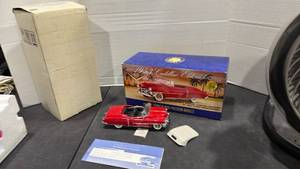 lot 1034 image: 1953 Cadillac Eldorado Convertible red scale model die cast car with box