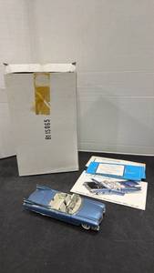 lot 1037 image: 1959 Cadillac Eldorado Biarritz Convertible blue scale model die cast car with box