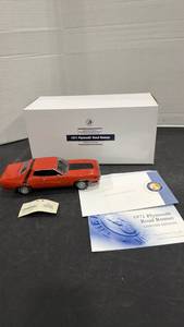lot 1044 image: 1971 Plymouth Road Runner orange scale model die cast car with box