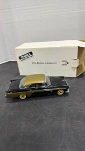 lot 1053 image: 1956 DeSoto Adventurer black and gold scale model die cast car with box