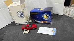 lot 1058 image: 2005 Chevrolet Corvette C6 red scale model die cast car with box