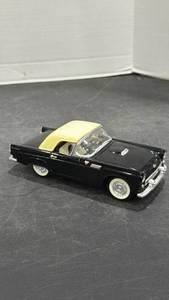 lot 1060 image: 1955 Ford Thunderbird black with white top scale model car