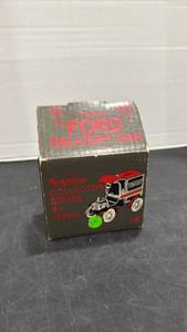 lot 1062 image: 1905 Ford Texaco Delivery Car die cast  coin bank with box