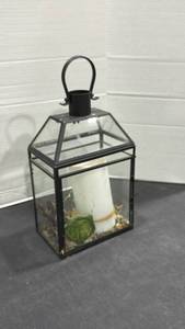 lot 2024 image: Lantern with decor
