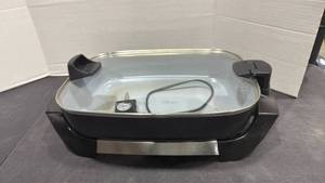 lot 2036 image: Oster electric skillet with cord and lid