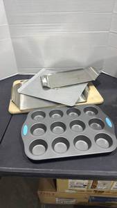 lot 2042 image: Wooden cutting board and bakeware