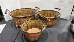lot 2059 image: Nesting rattan basket trio