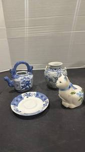 lot 2083 image: Blue and white china with cat decor