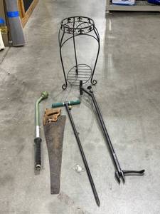 lot 2116 image: Plant stand (damaged) with yard tools and saw