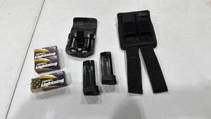 lot 2165 image: Smith & Wesson 9 mm magazines (2) and more