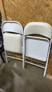 lot 2517 image: White padded folding chairs (2)