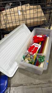lot 2524 image: Plastic tote and lid with gift wrap and bows