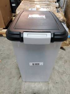 lot 18838 image: IRIS USA Airtight Dog Food Storage Container  30 lbs  33 Qt  Attachable Casters. BACK HAS A 2 INCH CRACK. - Retail $24