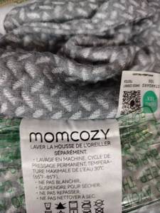 lot 1118 image: Momcozy Pillow with Gray and White Patterned Cover in Clear Bag