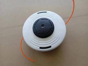 lot 2392 image: Trimmer Head 36-2 Fits Stihl FS100RX Weed Eater String Head