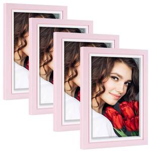 lot 8032 image: LBECUA Picture Frame Set of 4 4x6 Pink Wooden