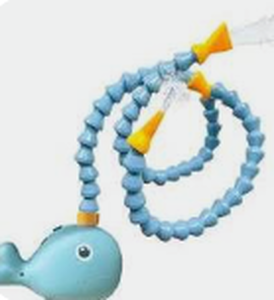 lot 5624 image: Water Table Pump Toy with Blue Whale Base and Flexible Hose - Stock image may not match actual product images