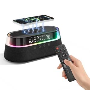 lot 1328 image: KUANGXIANG 6-in-1 Wireless Charger Bluetooth Speaker Alarm Clock 15W