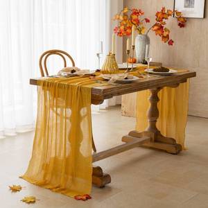 lot 8306 image: Keketoarrange Fall Golden Cheesecloth Table Runner 120 Inch