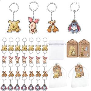 lot 2038 image: Winnie Baby Shower Favor Set 28 Keychains 28 Organza Bags 28 Cards