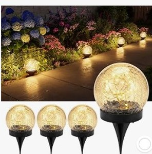 lot 1536 image: Solar Garden Light Crackle Glass Globe Style with Black Bases
