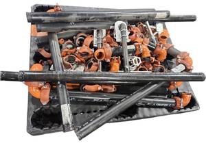 lot 504 image: Lot of Victaulic Grooved Couplings, Orange Elbows & Black Steel Pipe Sections